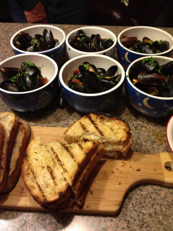 Gypsy Mussels with kalamata olives, Mad Pickler's hot peppers, tomato, garlic and grilled Orchard Hill Country Loaf